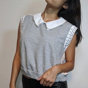 Grey sweatshirt and sheer back with metal detail